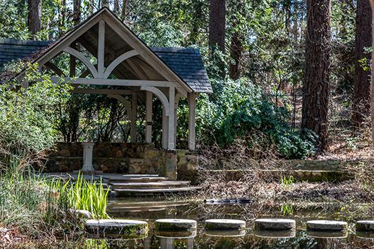 Blomquist pavilion and millpond with stepping stones Blomquist pavilion and millpond with stepping stones